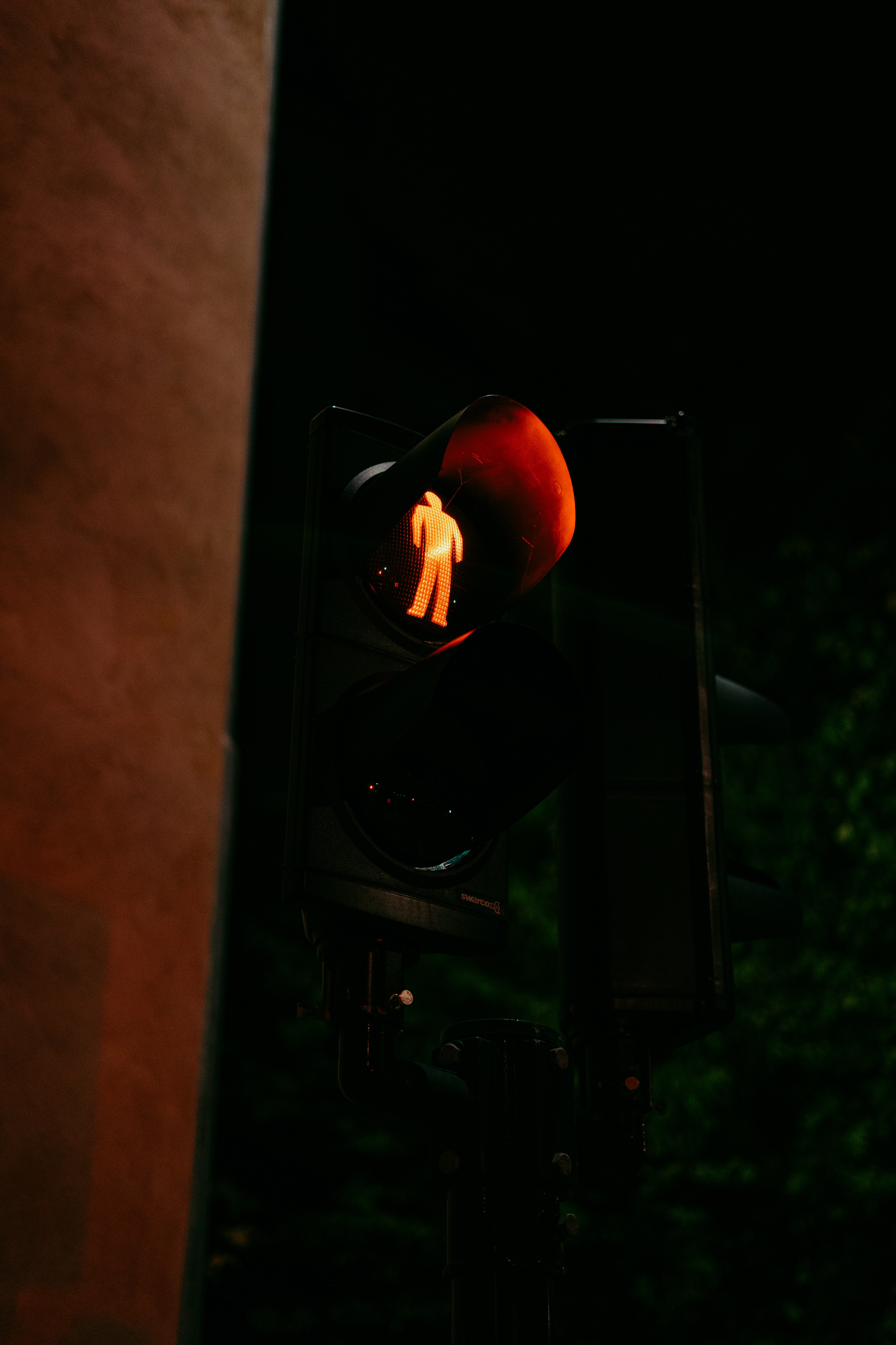 a traffic light that has a person on it